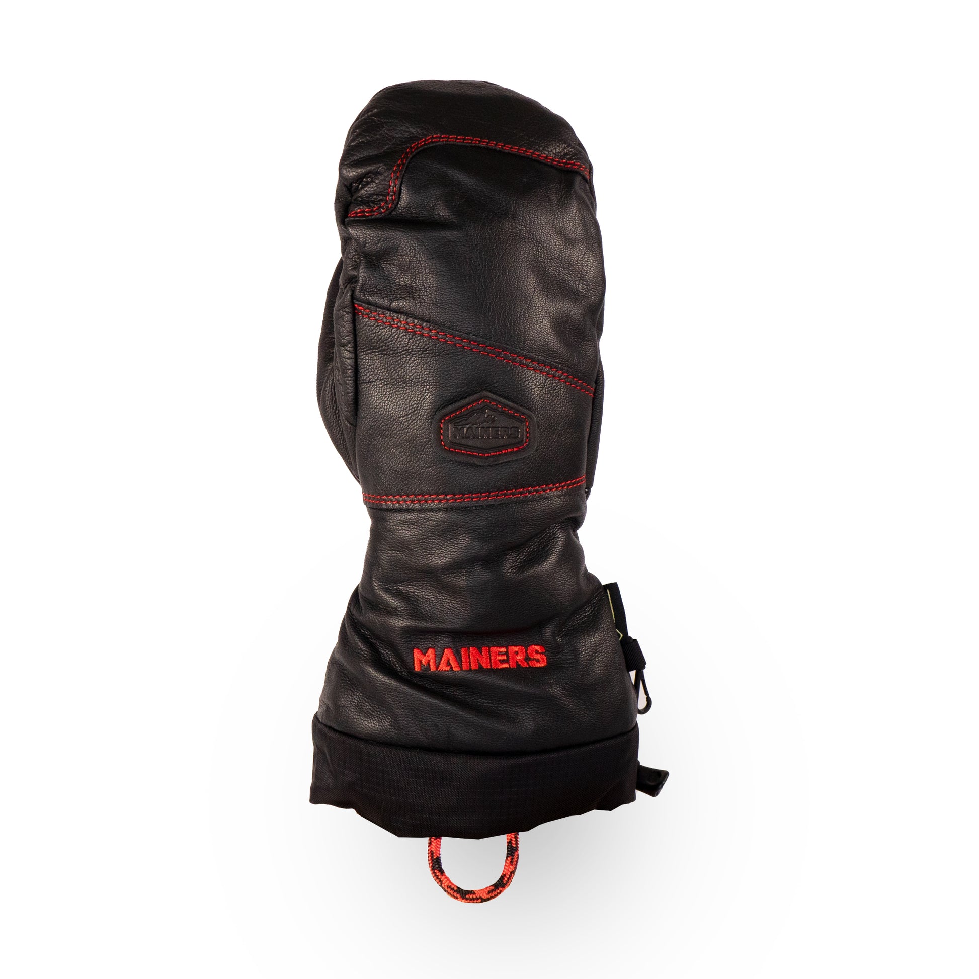 A single mitten from the Mainers All-Leather Mitts collection, featuring black leather with red stitching and "MAINERS" embroidered in red on the cuff, designed for extreme wind resistance.