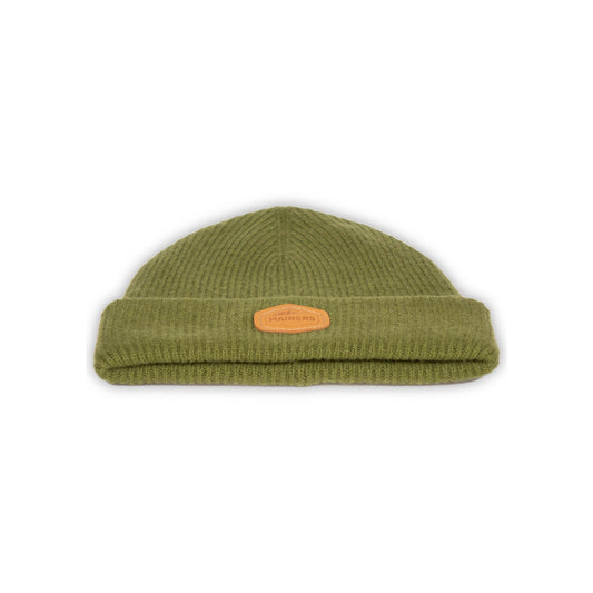 A green Mainers Cashmere Beanie with a brown label.