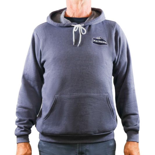 A man wearing a Mainers pullover hoodie.
