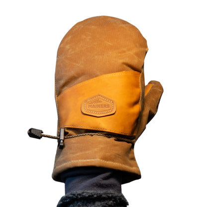 A Peaks Mitts leather glove on a hand by Mainers.