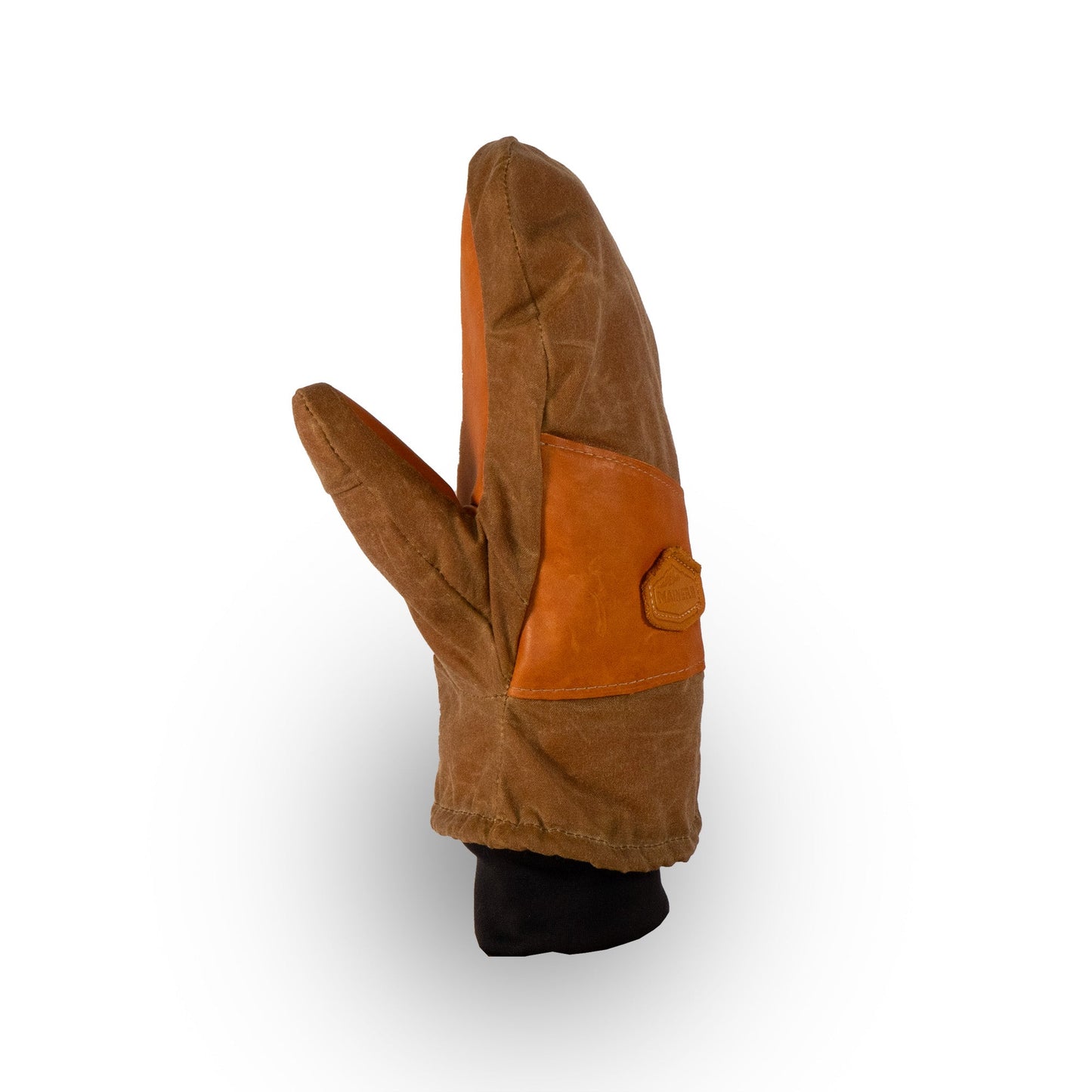 The Peaks Mitts by Mainers are renowned for their rugged durability, showcasing a brown mitt with a contrasting leather patch set against a white background, making them perfect for your next outdoor adventure.