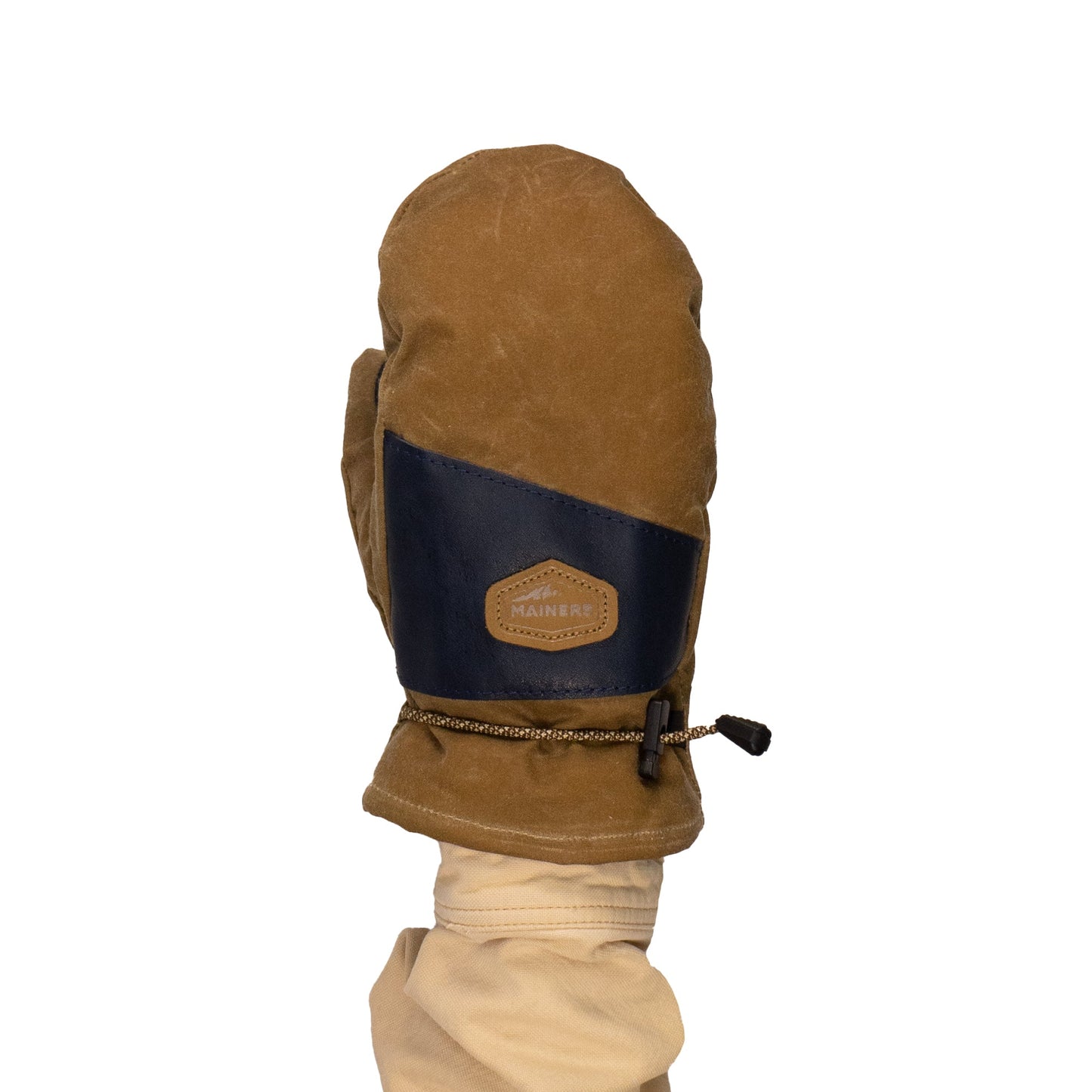 The Mainers' Portland Mitts are showcased against a plain white background, featuring a brown mitten design with a navy accent and waxed canvas finish, complemented by a leather palm and drawstring at the wrist.