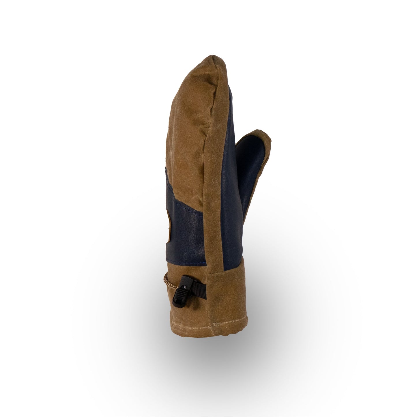 The Portland Mitts by Mainers feature a chic brown leather body and a black leather palm, complete with a stylish buckled strap. They stand elegantly upright against a plain white background, perfectly blending functionality with fashion.