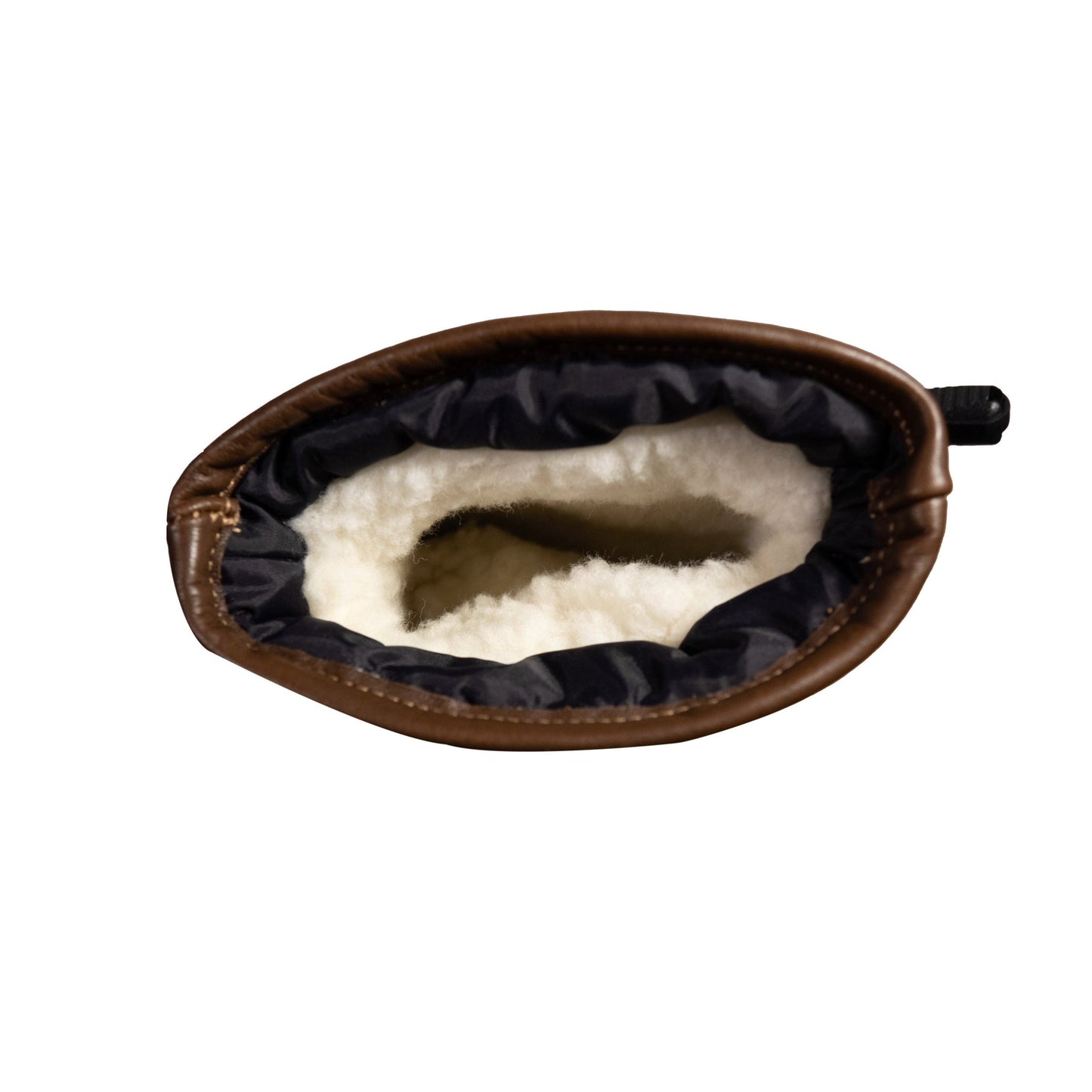An aerial view reveals the craftsmanship of the Portland All-Leather Mitts by Mainers, featuring a cozy white wool-pile lining.