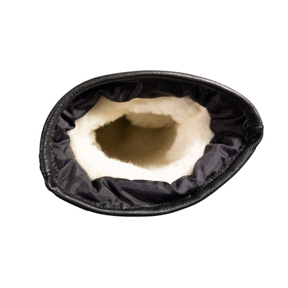 The inside view of the Portland All-Leather Mitts, crafted by Mainers, showcases exquisite Maine craftsmanship with a luxurious wool-pile lining that provides unmatched warmth and comfort in black and white.