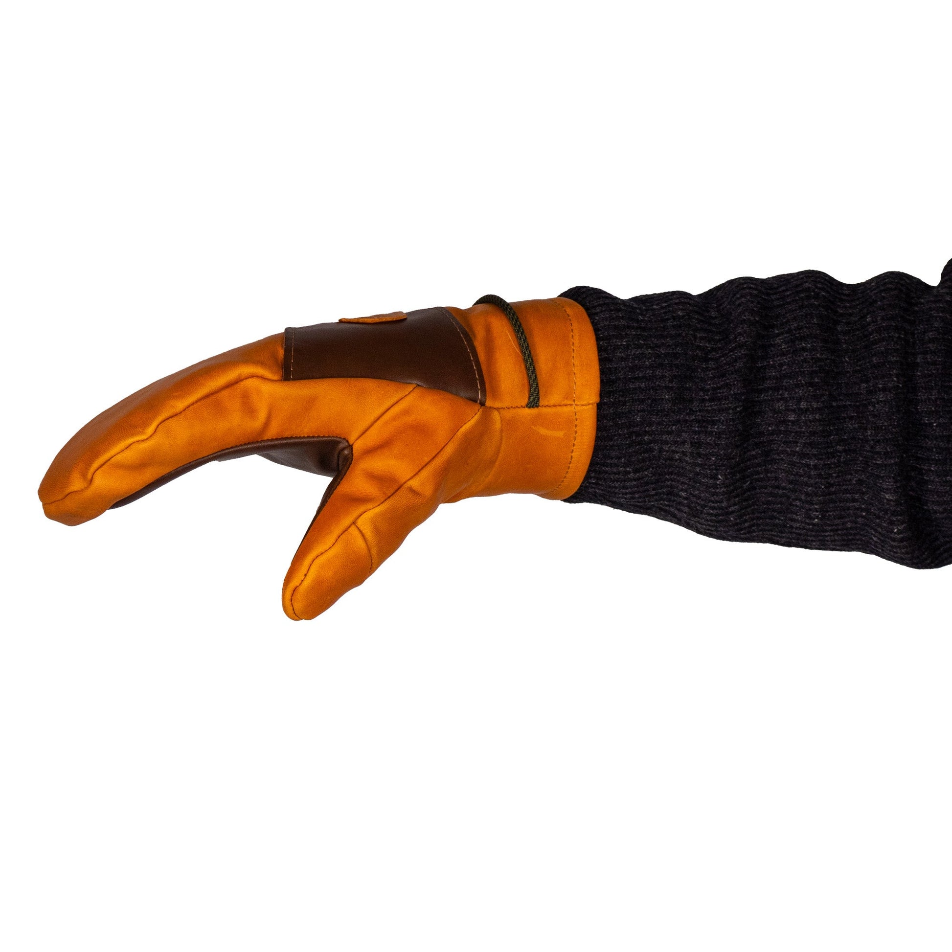 A Portland All-Leather Mitt by Mainers, featuring an orange leather exterior and a wool-pile lining, along with a black sleeve, is showcased against a white background, reflecting exquisite Maine craftsmanship.
