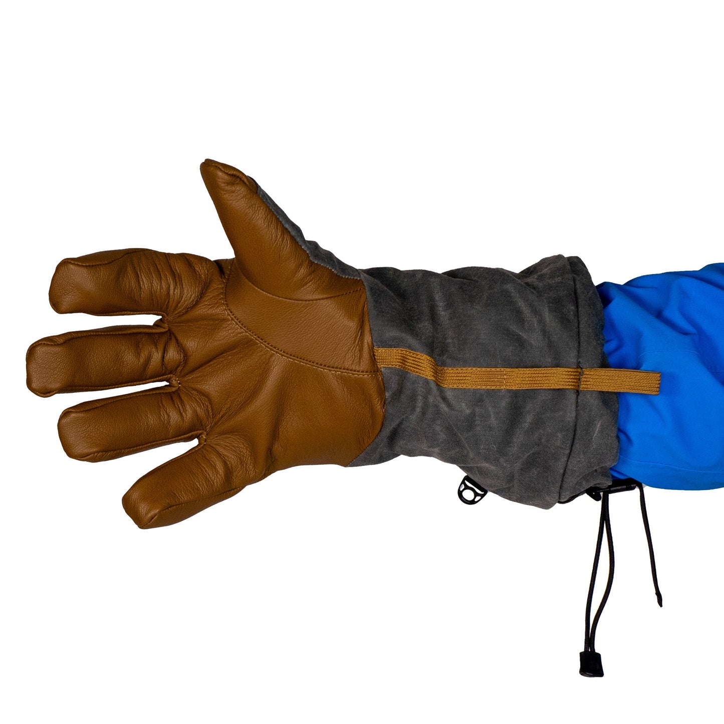 A Mainers Bethel Glove in brown leather and gray fabric elegantly cradles the left hand, highlighting its outdoor performance design. It features a blue sleeve and a drawstring wrist closure, with waxed canvas accents enhancing durability when the palm faces upward.