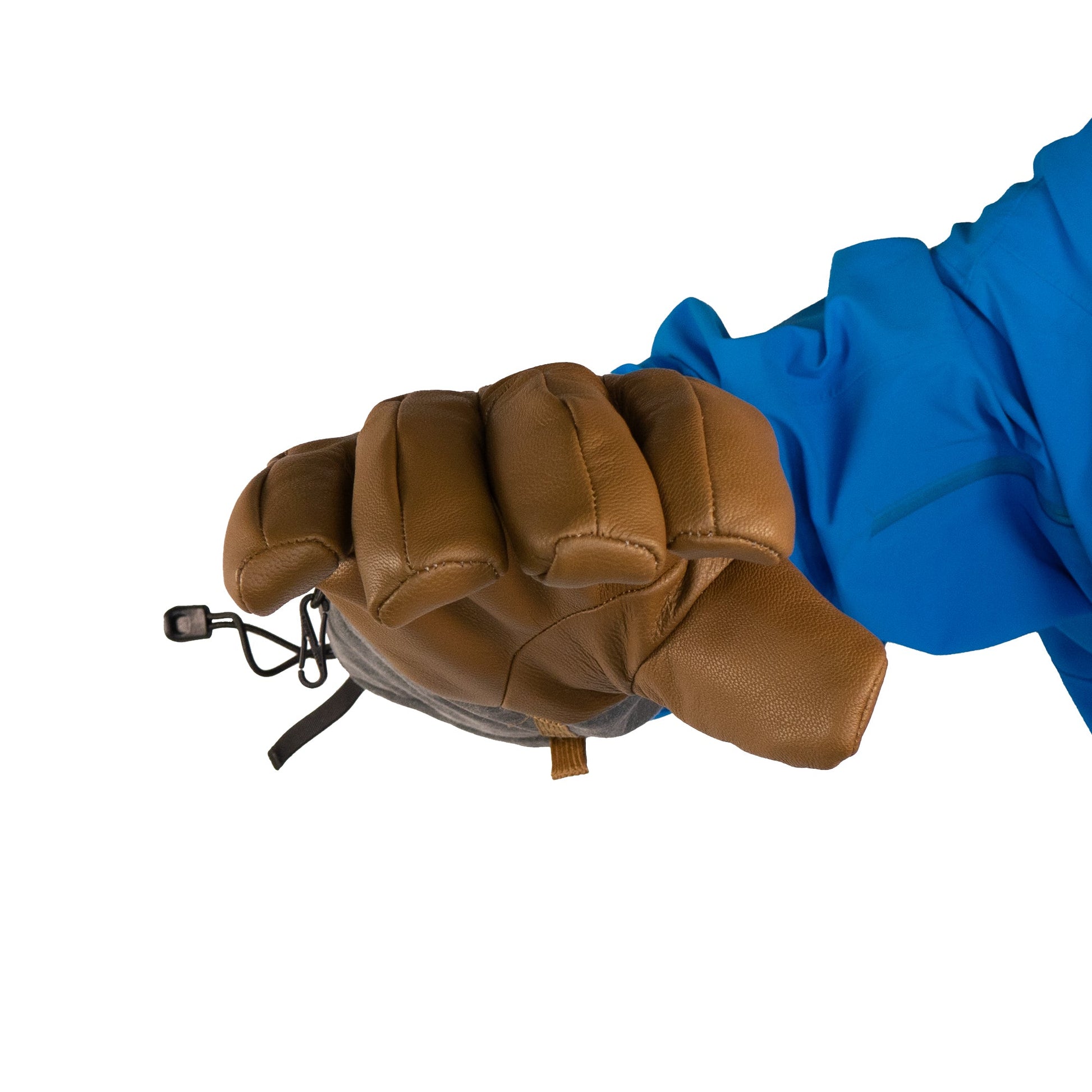 A person wearing a blue jacket and brown insulated gloves with a wrist strap from the Mainers Bethel Glove collection is shown, ready for optimal outdoor performance.