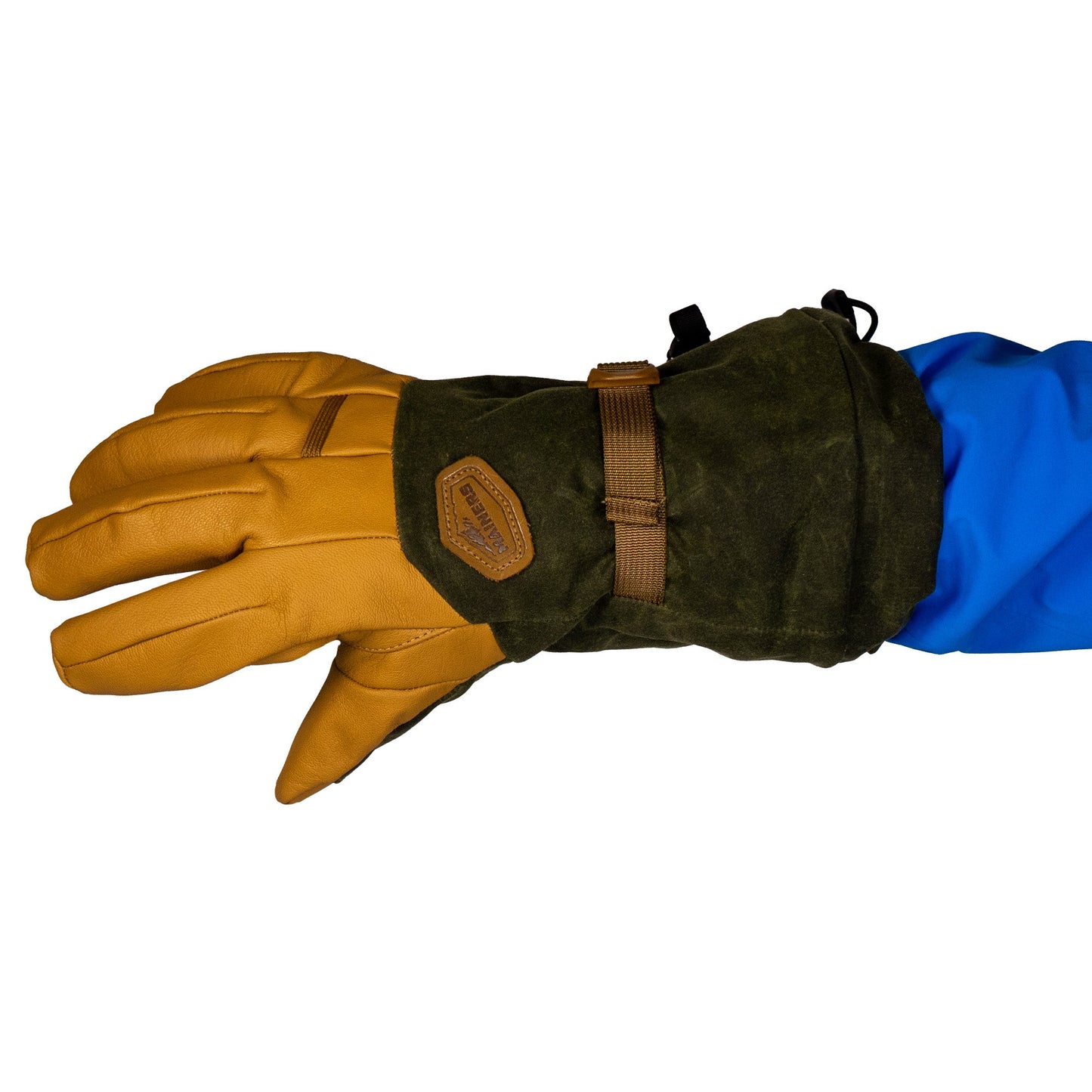 The Mainers Bethel Glove, made with brown leather and green fabric, features a waxed canvas strap designed for improved outdoor performance, making it a perfect match for a blue sleeve.