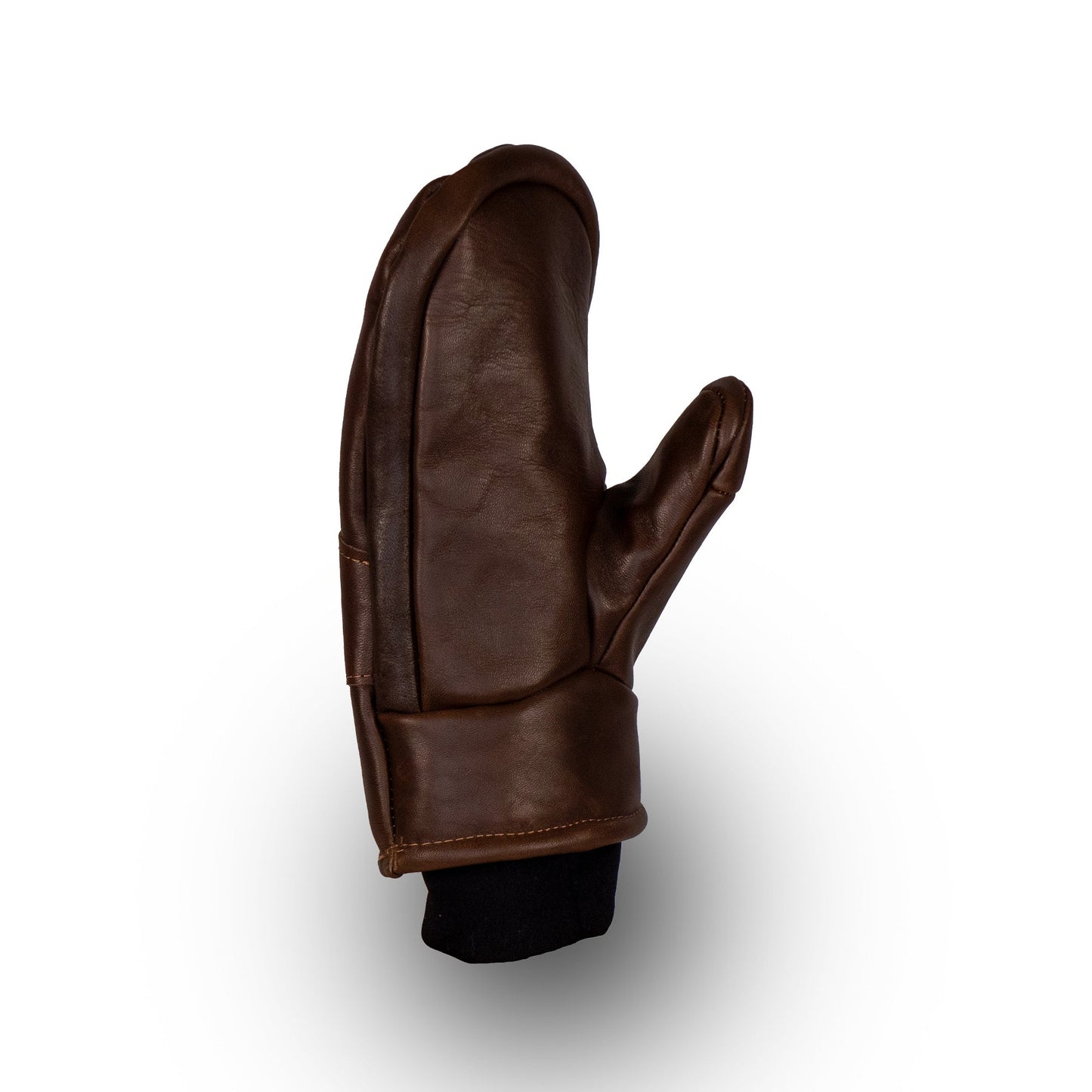 The Peaks All-Leather Mitts by Mainers, made from high-quality brown leather and featuring a stylish black cuff, are ideal for cold-weather adventures. Displayed elegantly against a white background, these mittens blend style with functionality effortlessly.