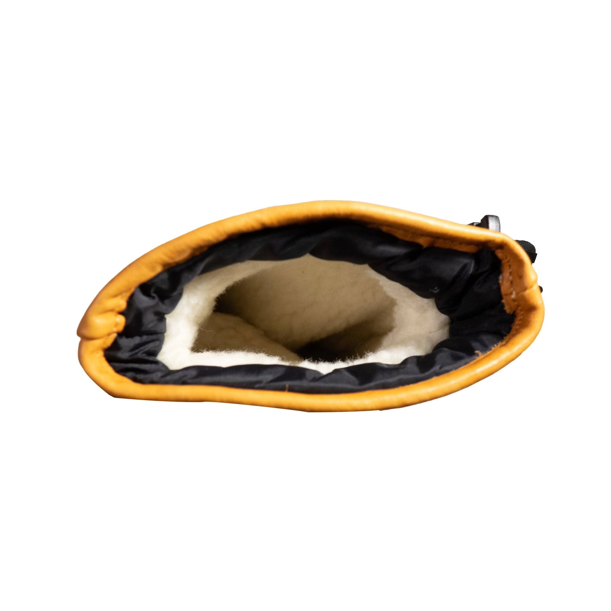 Top view of an open Portland All-Leather Mitt with a yellow exterior and wool-pile lining, showcasing the elegance of Mainers craftsmanship, lying on a white background.