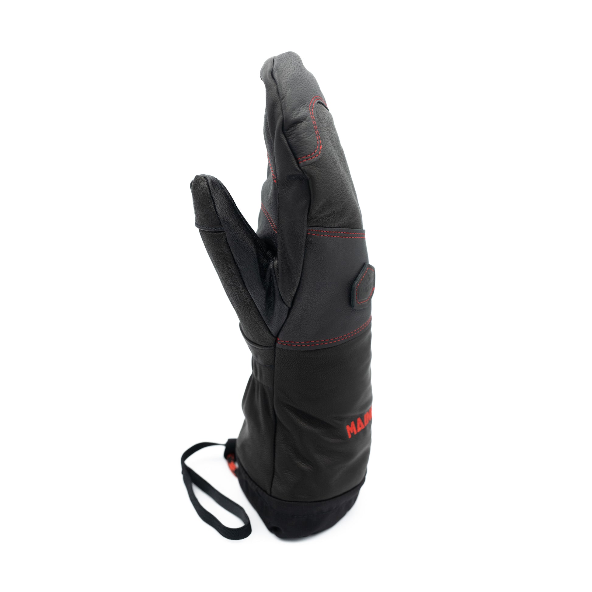A Mainers black leather glove with red text.
